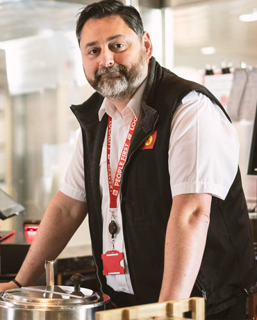 Crew member in vessel cafe
